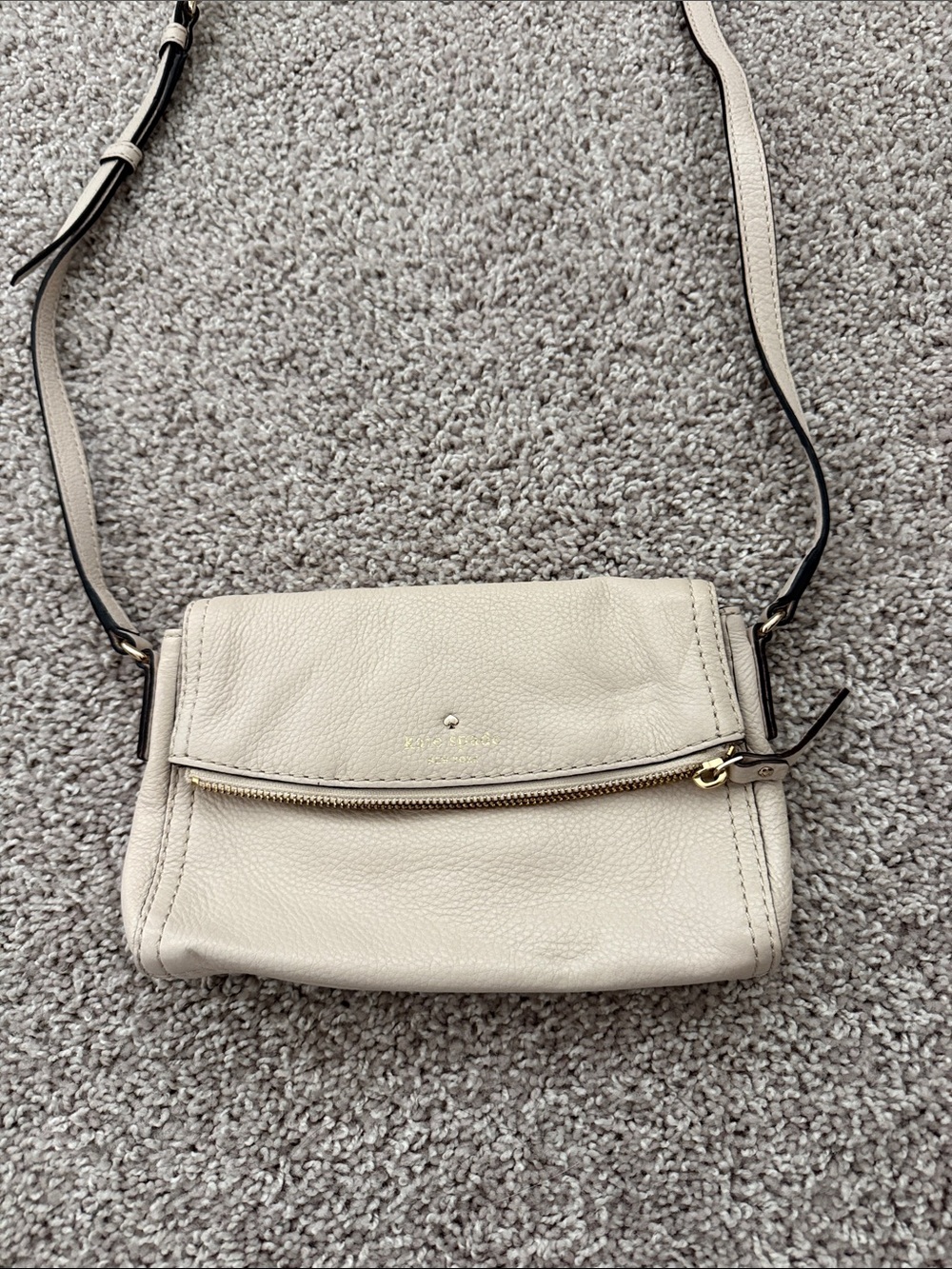 kate spade cream pebbled leather crossbody with gold-tone zipper